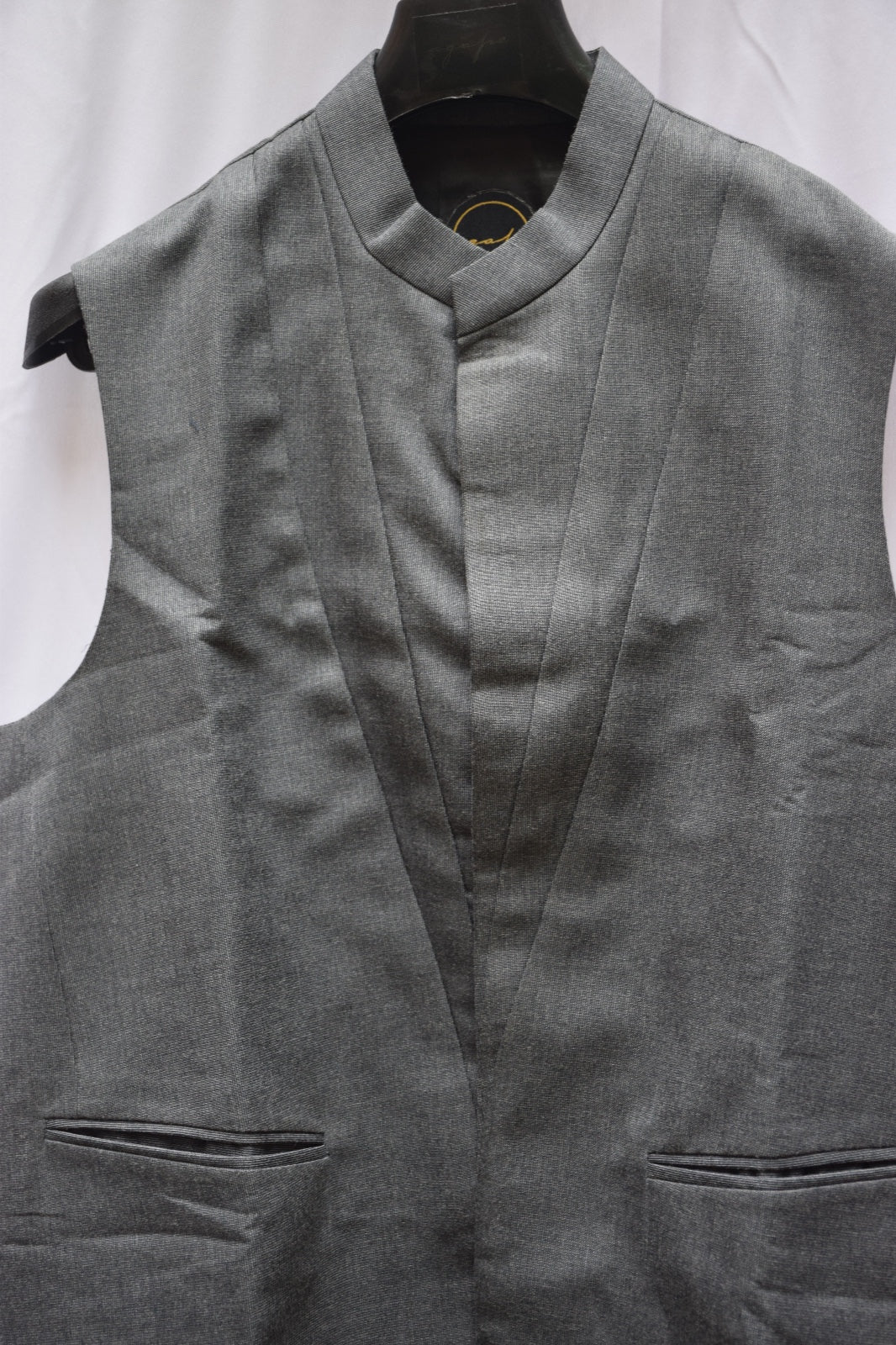 Grey waistcoat with panelling design